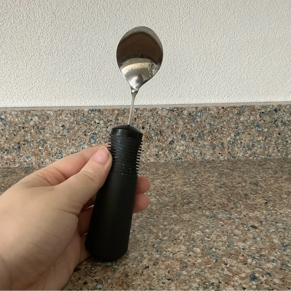 Oxo handicapped fork spoon button assist disabled elderly arthritis